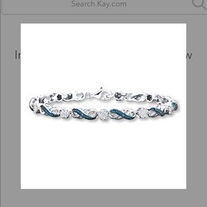 Infinity Bracelet 1/4 ct tw Diamonds And S Silver